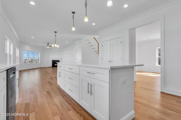 Fireplace, Interior, Pendant Lights, Recessed Lighting, Wood Texture Flooring