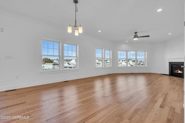 Empty room, Fireplace, Interior, Pendant Lights, Recessed Lighting, Wood Texture Flooring