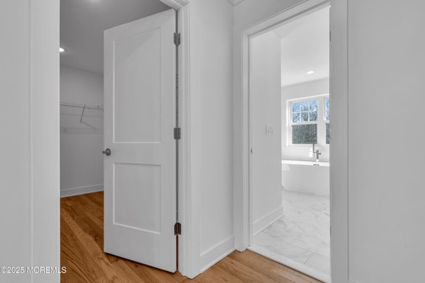 Bathroom, Free Standing Baths, Interior, Marble, Recessed Lighting, Walk-in Closets, Wood Texture Flooring