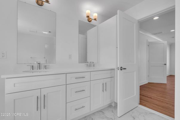 Bathroom, Dual Sink Vanities, Interior, Marble, Recessed Lighting, Wood Texture Flooring