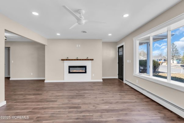 Empty room, Fireplace, Interior, Recessed Lighting, Wood Texture Flooring
