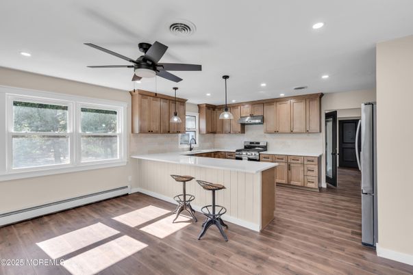 Interior, Kitchen, Pendant Lights, Recessed Lighting, Stainless Steel Appliances, Wood Texture Flooring