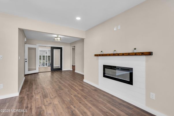 Empty room, Fireplace, Interior, Recessed Lighting, Wood Texture Flooring