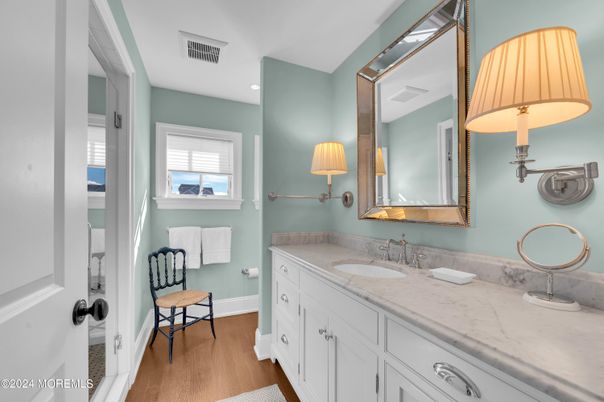 Bathroom, Dual Sink Vanities, Interior, Recessed Lighting, Wood Texture Flooring