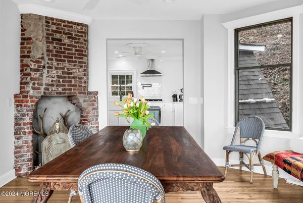 Dining room, Fireplace, Interior, Kitchen, Recessed Lighting, Stone Walls, Wood Texture Flooring
