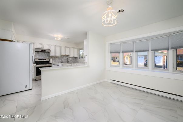 Interior, Kitchen, Marble, Pendant Lights, Stainless Steel Appliances