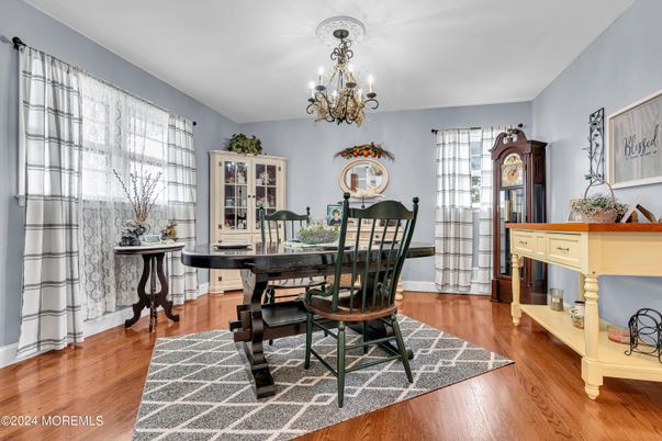 Chandelier, Dining room, Interior, Piano, Wood Texture Flooring