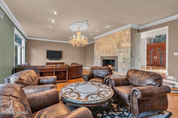 Chandelier, Fireplace, Interior, Living room, Recessed Lighting, Wood Texture Flooring