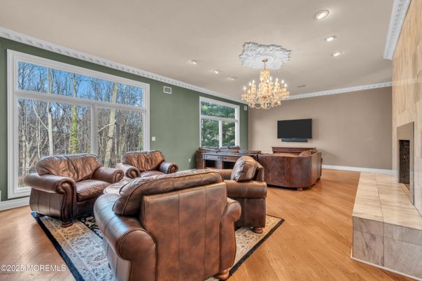 Chandelier, Fireplace, Interior, Living room, Recessed Lighting, Wood Texture Flooring