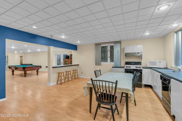 Billiard Table, Dining room, Game Room, Interior, Kitchen, Recessed Lighting, Wood Texture Flooring