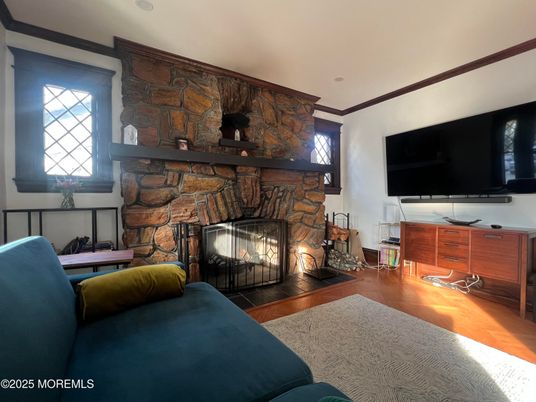 Fireplace, Interior, Recessed Lighting, Stone Walls, Wood Texture Flooring