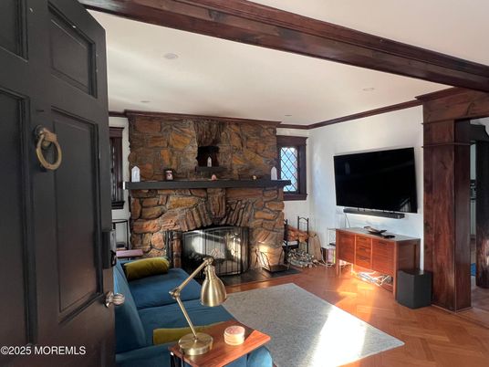 Fireplace, Interior, Living room, Recessed Lighting, Stone Walls, Wood Texture Flooring