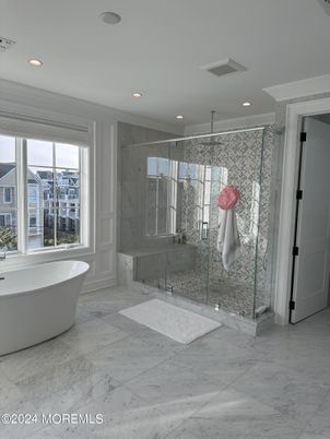 Bathroom, Free Standing Baths, Glass Shower, Interior, Marble, Marble Walls, Recessed Lighting
