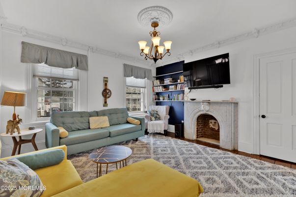 Chandelier, Fireplace, Interior, Living room