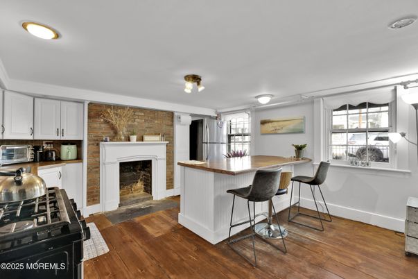 Fireplace, Interior, Kitchen, Recessed Lighting, Stone Walls, Wood Texture Flooring