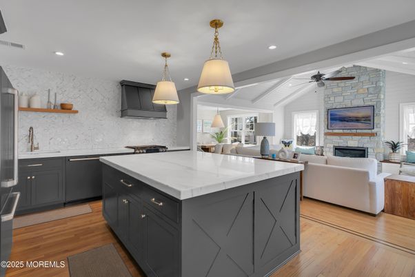 Fireplace, Interior, Kitchen, Living room, Pendant Lights, Recessed Lighting, Stone Walls, Wood Texture Flooring
