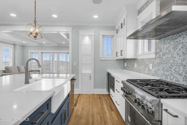 Chandelier, Interior, Kitchen, Pendant Lights, Recessed Lighting, Stainless Steel Appliances, Wood Texture Flooring