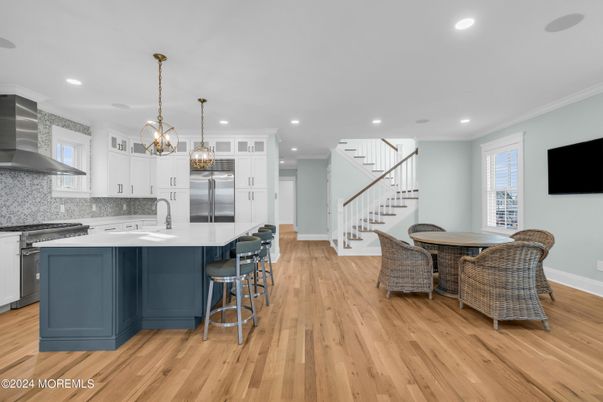 Dining room, Interior, Kitchen, Pendant Lights, Recessed Lighting, Stainless Steel Appliances, Wood Texture Flooring
