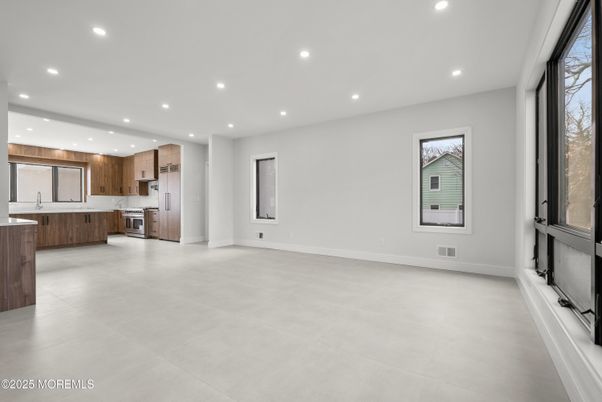 Empty room, Interior, Kitchen, Recessed Lighting, Stainless Steel Appliances