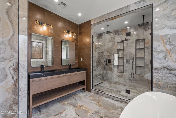 Bathroom, Dual Sink Vanities, Free Standing Baths, Glass Shower, Interior, Marble Walls, Recessed Lighting