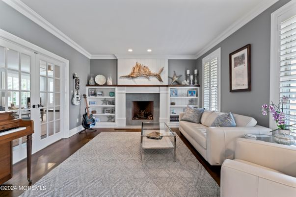 Fireplace, Interior, Living room, Piano, Recessed Lighting, Wood Texture Flooring