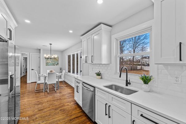 Chandelier, Dining room, Interior, Kitchen, Recessed Lighting, Stainless Steel Appliances, Wood Texture Flooring