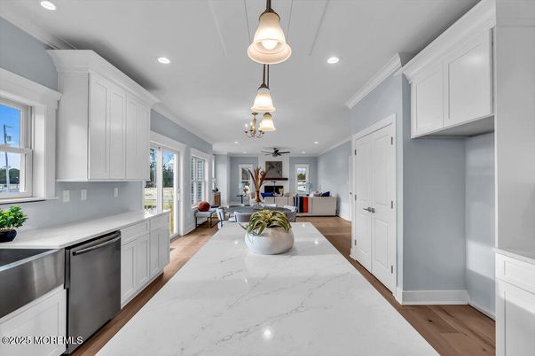 Dining room, Interior, Kitchen, Living room, Pendant Lights, Recessed Lighting, Stainless Steel Appliances, Wood Texture Flooring