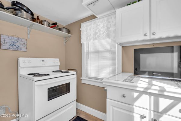 Interior, Kitchen, Tile Countertops, Wood Texture Flooring
