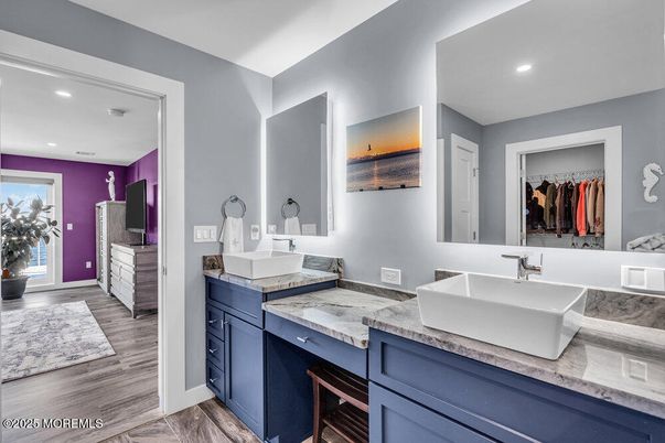 Bathroom, Dual Sink Vanities, Interior, Recessed Lighting, Wood Texture Flooring