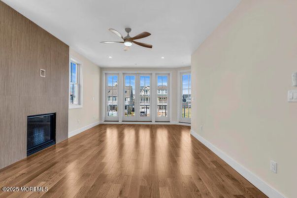 Empty room, Fireplace, Interior, Recessed Lighting, Wood Texture Flooring