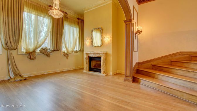 Chandelier, Empty room, Fireplace, Interior, Wood Texture Flooring