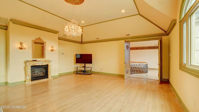 Chandelier, Fireplace, Interior, Recessed Lighting, Wood Texture Flooring