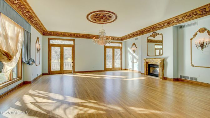Chandelier, Empty room, Fireplace, Interior, Wood Texture Flooring
