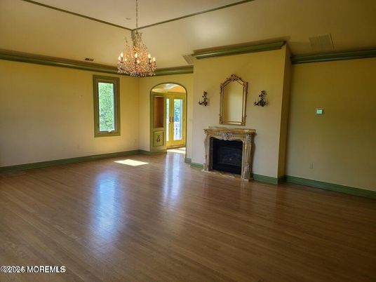 Chandelier, Empty room, Fireplace, Interior, Wood Texture Flooring