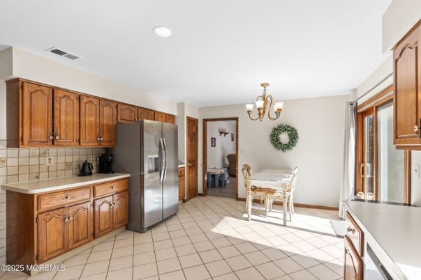 Chandelier, Dining room, Interior, Kitchen, Recessed Lighting, Stainless Steel Appliances