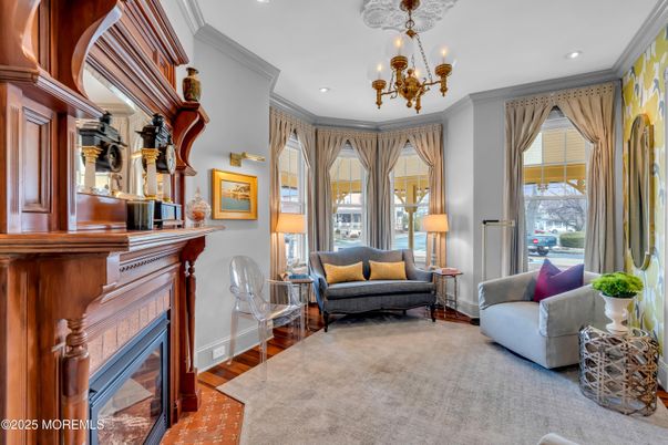 Chandelier, Fireplace, Interior, Living room, Recessed Lighting, Wood Texture Flooring