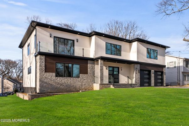Attached, Backyard, Exterior, Facade, Brick Facade, Modern
