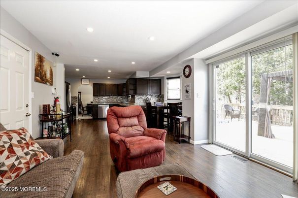 Dining room, Interior, Kitchen, Living room, Recessed Lighting, Stainless Steel Appliances, Wood Texture Flooring