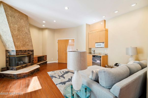 Fireplace, Interior, Kitchen, Living room, Recessed Lighting, Wood Texture Flooring