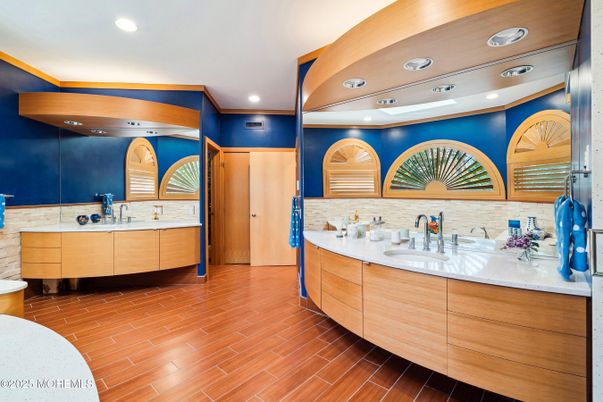 Bathroom, Dual Sink Vanities, Interior, Recessed Lighting, Wood Texture Flooring