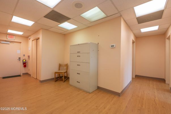 Elevator, Interior, Recessed Lighting, Wood Texture Flooring