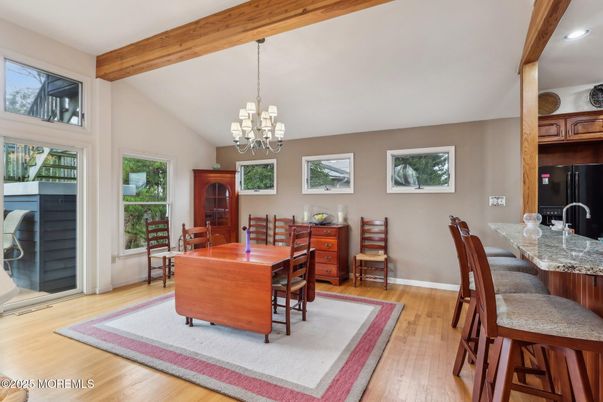 Chandelier, Dining room, Interior, Recessed Lighting, Wooden Beams, Wood Texture Flooring