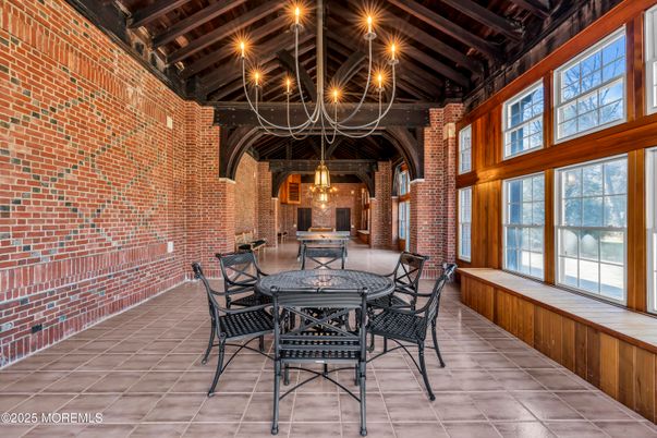 Chandelier, Dining room, Interior, Pendant Lights, Stone Walls, Wooden Beams