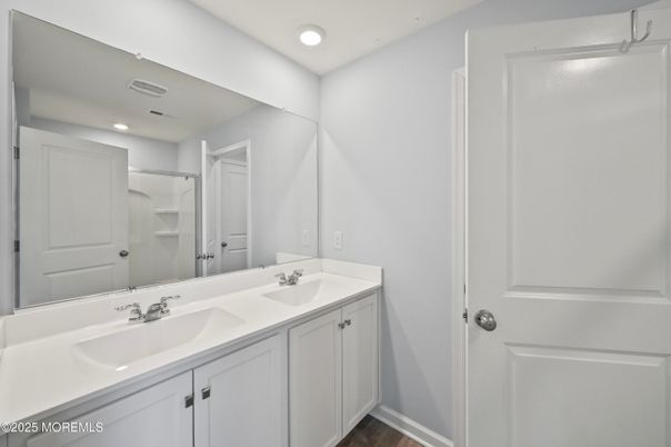 Bathroom, Dual Sink Vanities, Interior, Recessed Lighting, Walk-in Closets