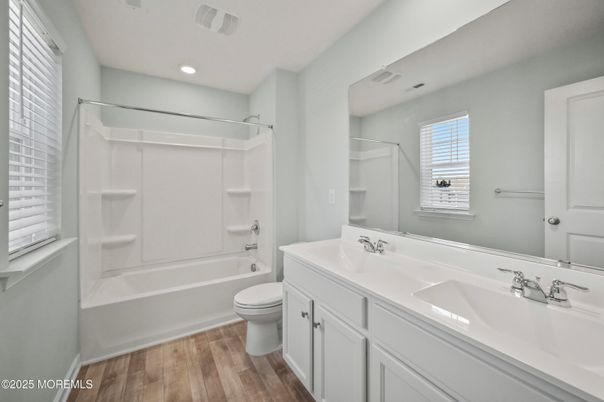 Bathroom, Dual Sink Vanities, Interior, Recessed Lighting, Wood Texture Flooring