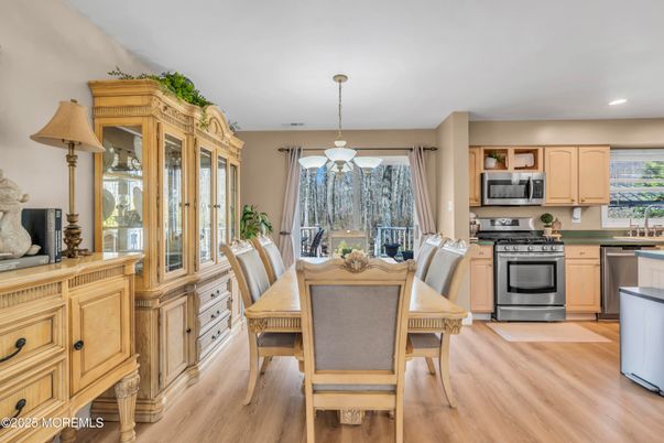 Dining room, Interior, Kitchen, Pendant Lights, Recessed Lighting, Stainless Steel Appliances, Wood Texture Flooring