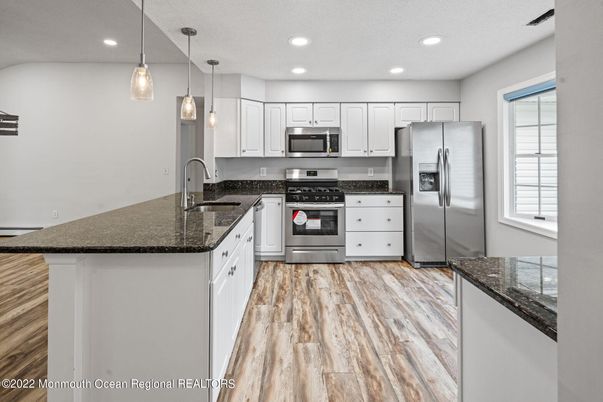 Interior, Kitchen, Pendant Lights, Recessed Lighting, Stainless Steel Appliances, Wood Texture Flooring