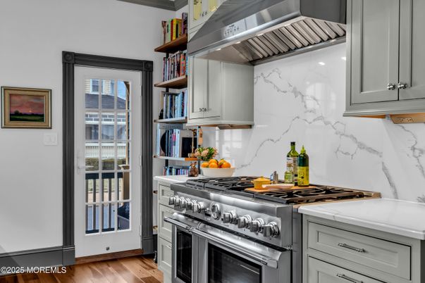 Interior, Kitchen, Marble Walls, Stainless Steel Appliances, Wood Texture Flooring