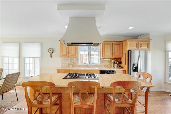 Dining room, Interior, Kitchen, Recessed Lighting, Stainless Steel Appliances, Wood Texture Flooring