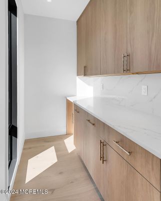 Interior, Marble Walls, Recessed Lighting, Wood Texture Flooring